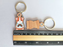 Load image into Gallery viewer, Guinea pig keyring, cavy wooden key fob, guinea pig key chain, bag charm, ethically sourced wood
