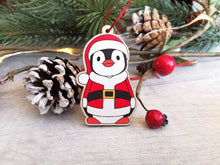 Load image into Gallery viewer, Penguin Santa decoration. Wooden Father Christmas ornament, responsibly resourced wood, Boo the penguin
