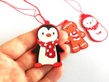 Load image into Gallery viewer, Penguin Christmas decorations. Set of three, frosted red acrylic penguin, snowman and gingerbread man. Cute Christmas tree ornaments.
