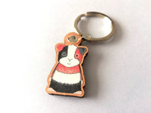 Load image into Gallery viewer, Guinea pig keyring, wooden cavy key fob, tri colour guinea pig key chain, wood bag charm, responsibly resourced wood
