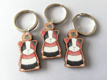 Load image into Gallery viewer, Guinea pig keyring, wooden cavy key fob, tri colour guinea pig key chain, wood bag charm, responsibly resourced wood
