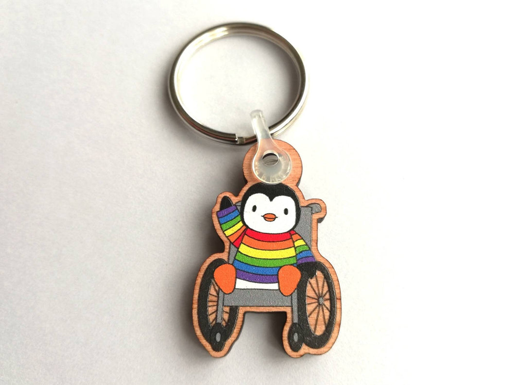 Penguin in a wheelchair keyring, rainbow penguin wooden key fob, penguin key chain, eco friendly charm, responsibly resourced wood