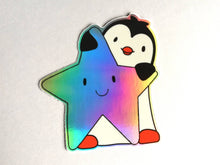 Load image into Gallery viewer, Penguin and star iridescent holographic vinyl sticker, rainbow effect star
