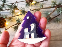 Load image into Gallery viewer, Penguin and star decoration. Eco friendly, purple recycled acrylic Christmas ornament, penguins in the snow
